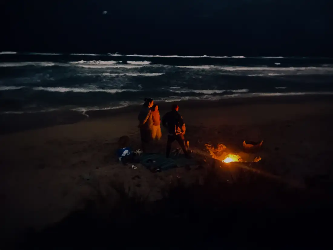 Embracing the upcoming New Year: A Beach Bonfire